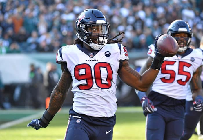 Houston Texans outside linebacker Jadeveon Clowney (90) celebrates after recovering fumble against the Philadelphia Eagles during the second quarter at Lincoln Financial Field.